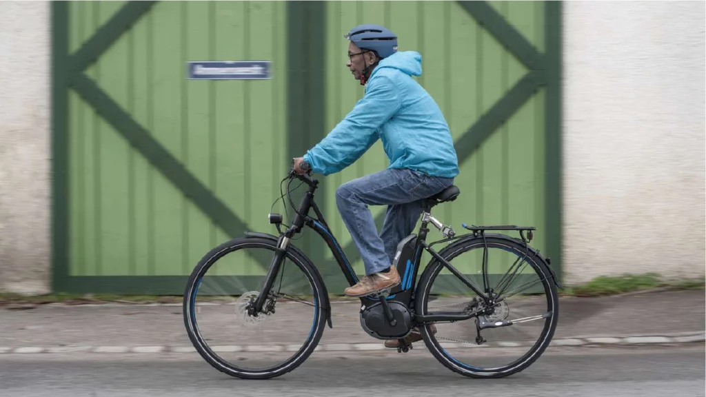 A man enjoying a ride on his converted electric bike
