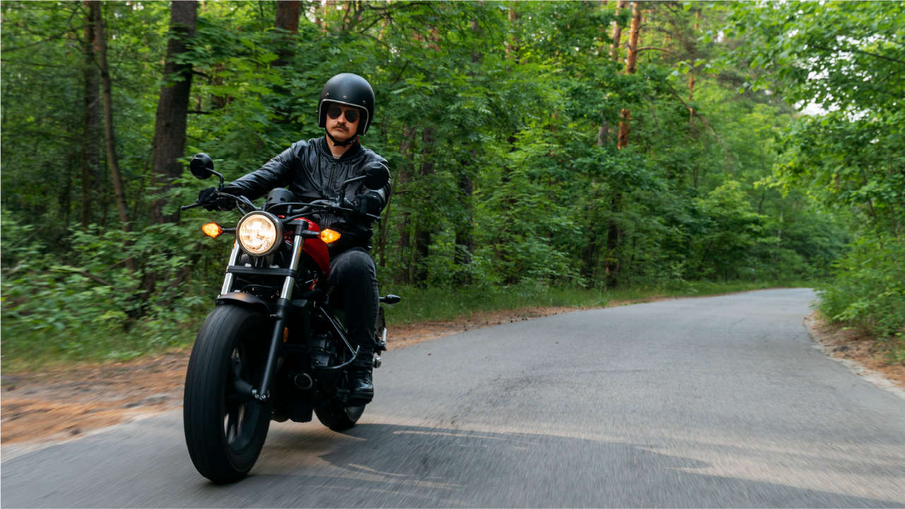 People Riding electric motorcycles happily in greenery