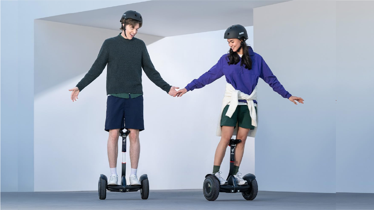 Man or a Woman Riding the Segway Ninebot S2