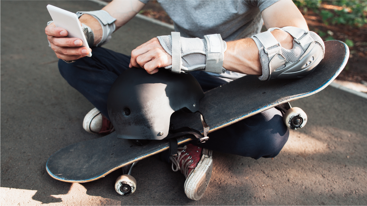 Electric skateboard safety of People wearing complete protection gear and riding
