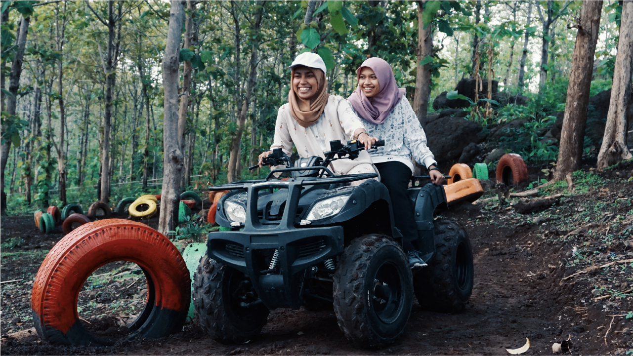 People enjoying a ride on Electric UTV